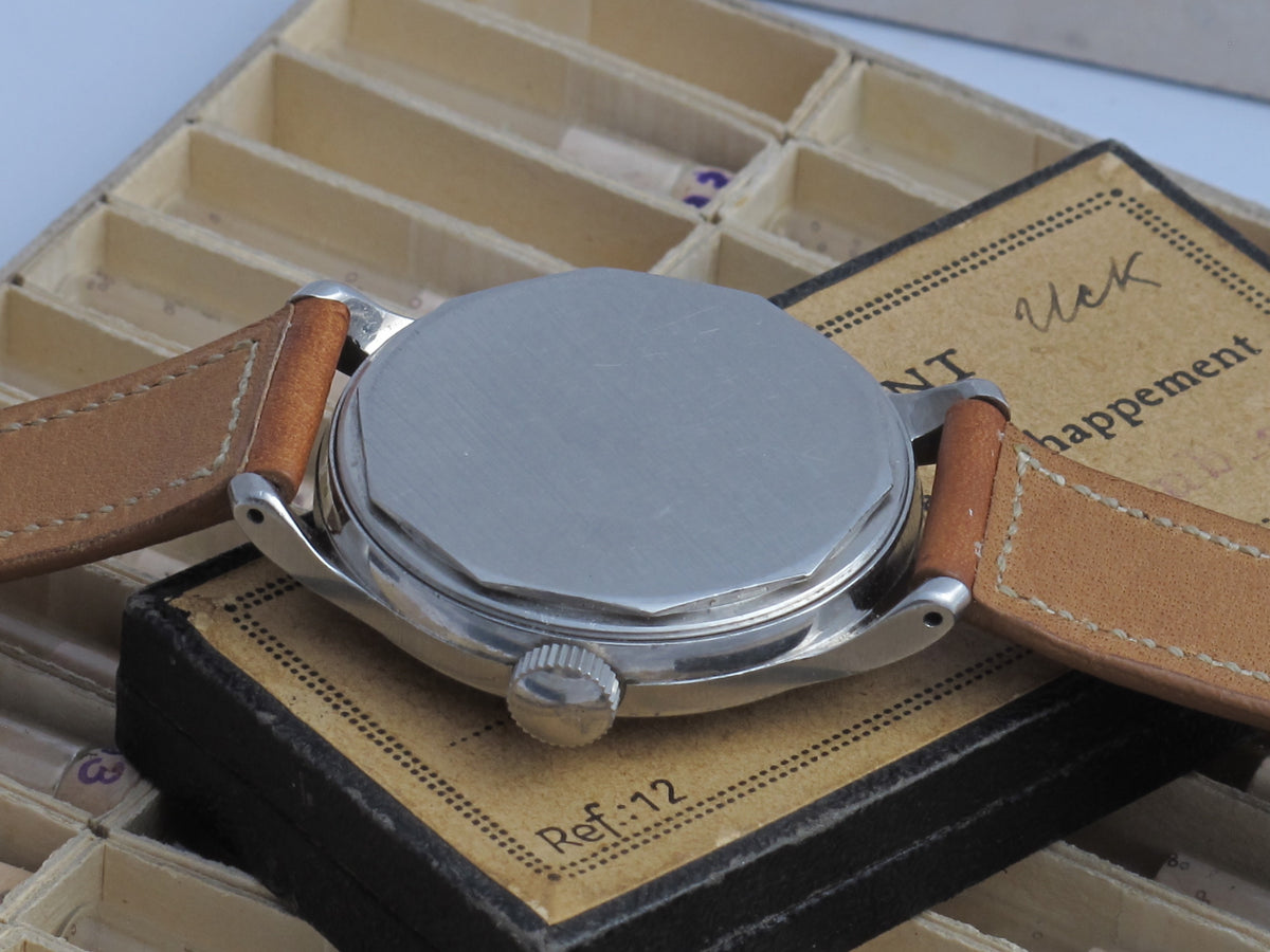 Movado sport black gilt radium dial 34mm FB case